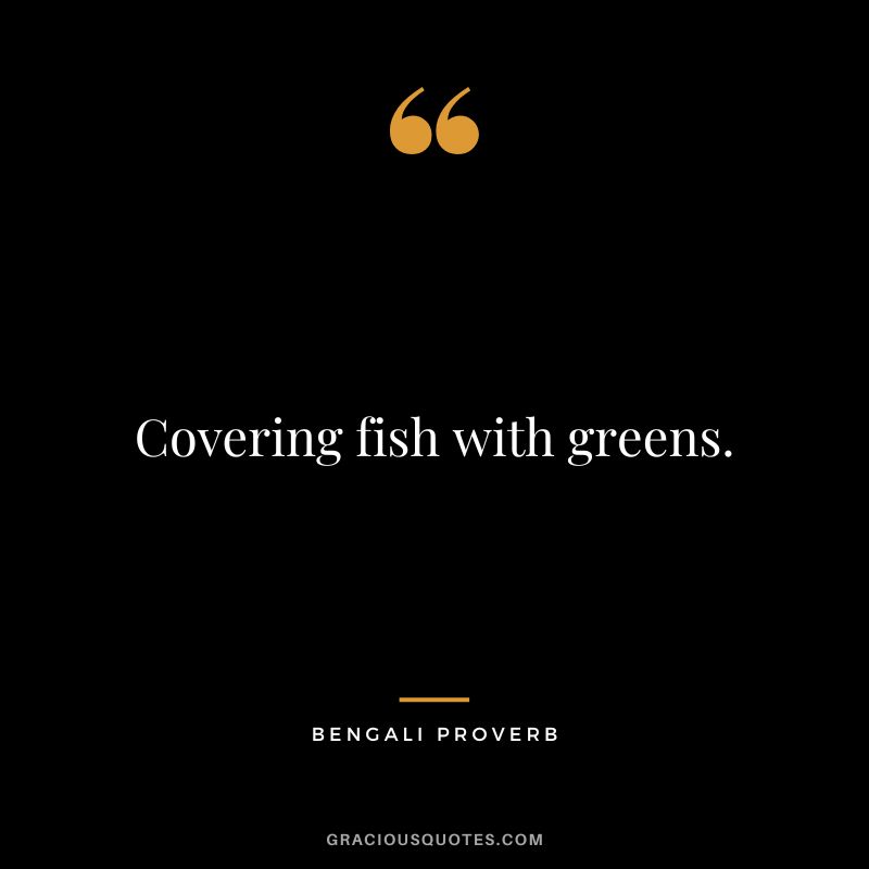 Covering fish with greens.